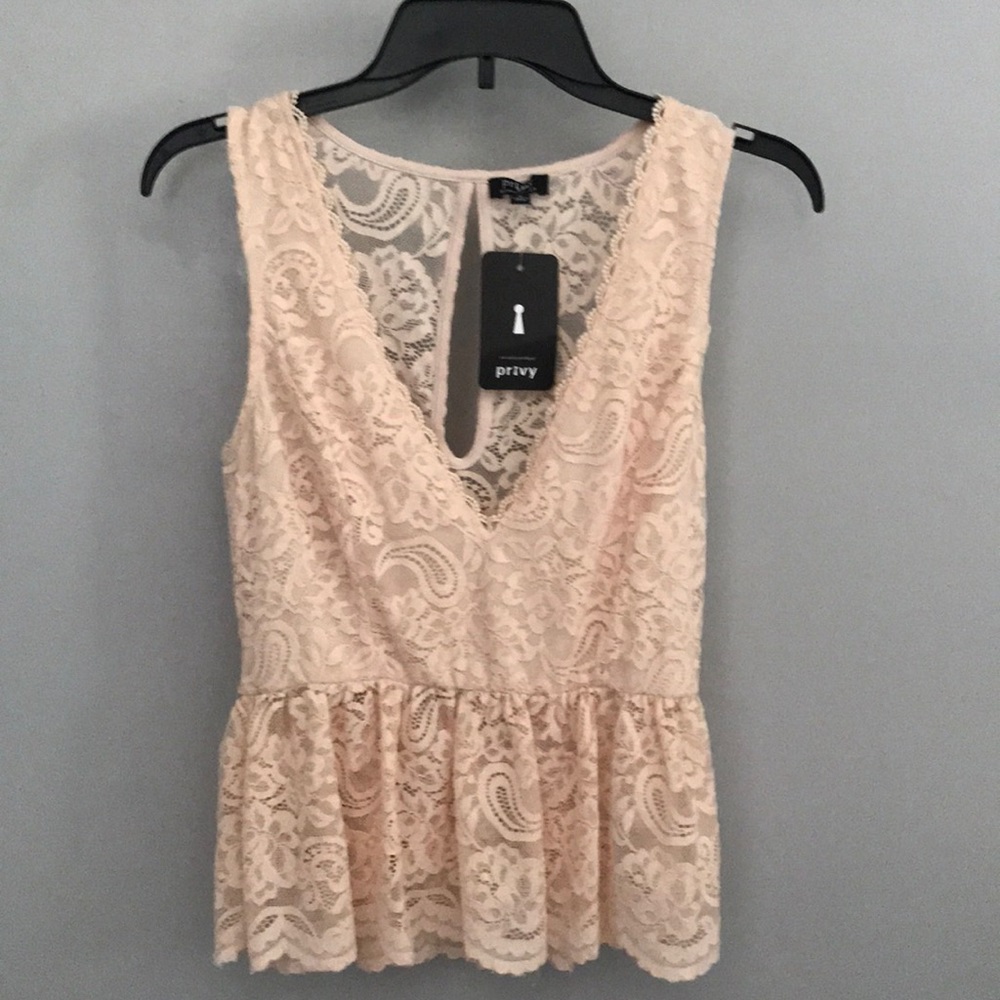 Privately Privileged light rose peplum top